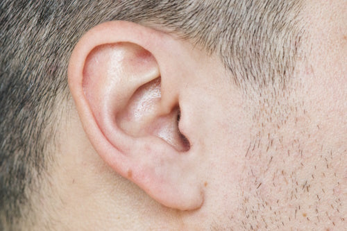 Acne Behind Ears: Causes and Solutions